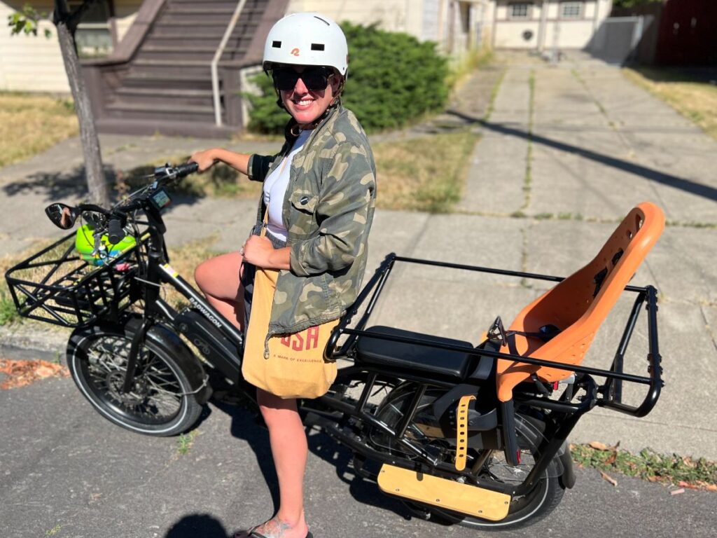 woman on an electric cargo bike